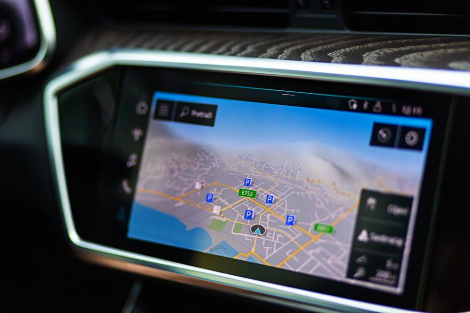Close-up of a car's touchscreen displaying GPS navigation in a modern vehicle interior.